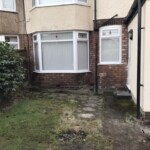 rear garden before picture Grounds maintenance service for residential garden in Southport